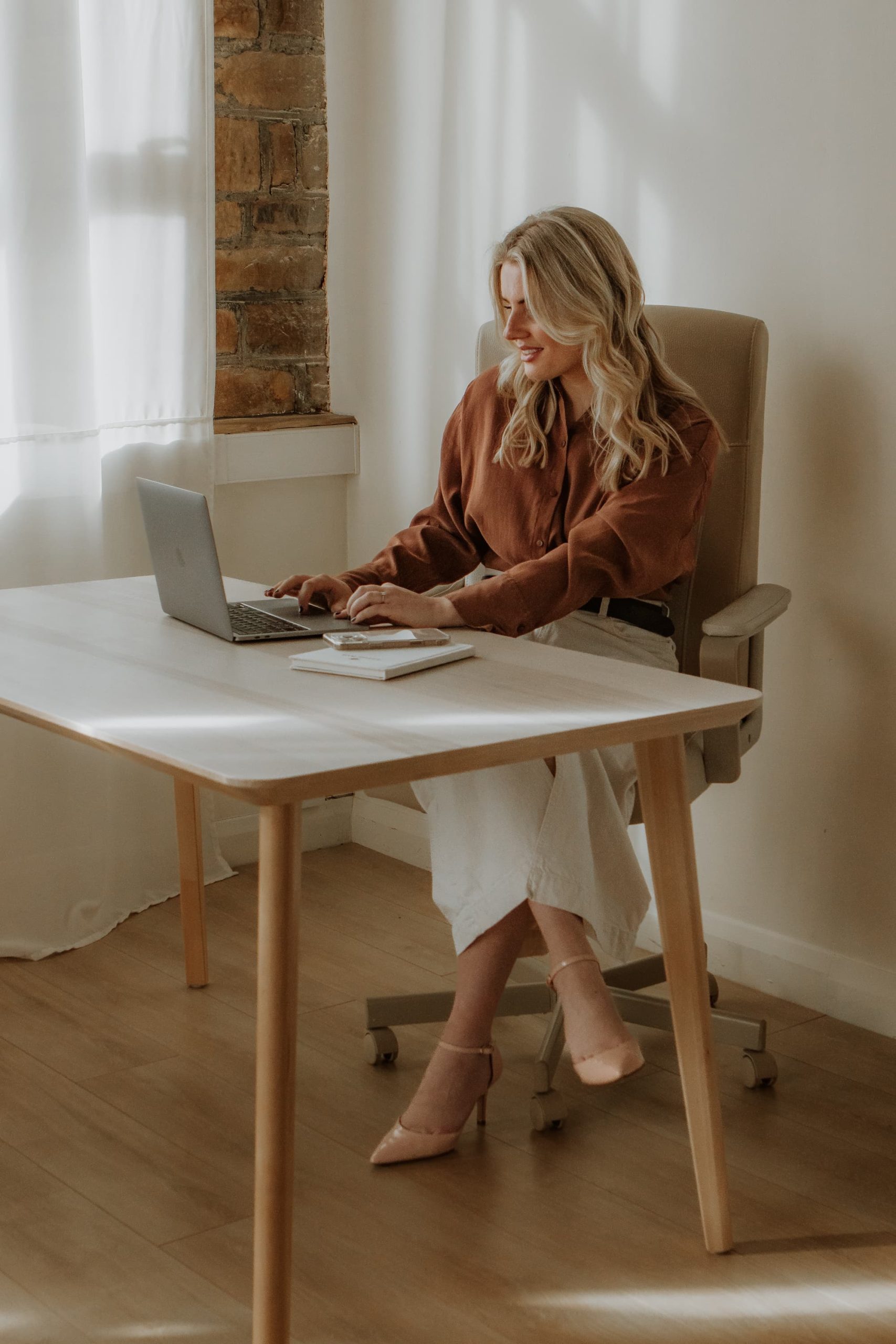 Romany Youell at her desk